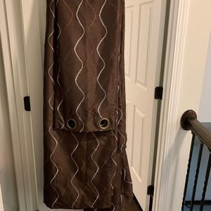 2 brown curtain panels